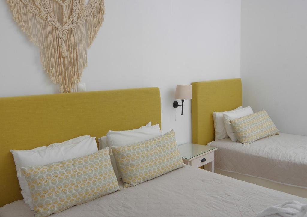 Кровать или кровати в номере Hotel Benois