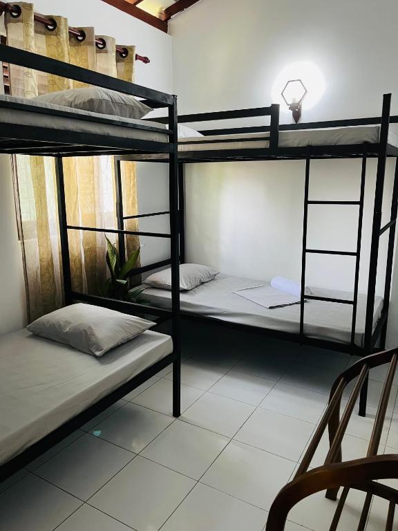 Postel nebo postele na pokoji v ubytování Star Eyes Hostel
