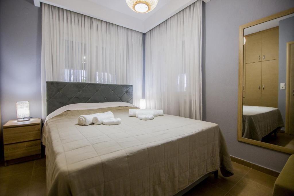 Postel nebo postele na pokoji v ubytování Villa Avra