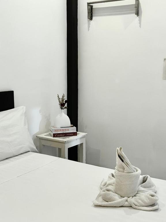 Postel nebo postele na pokoji v ubytování Mayad El Nido Inn