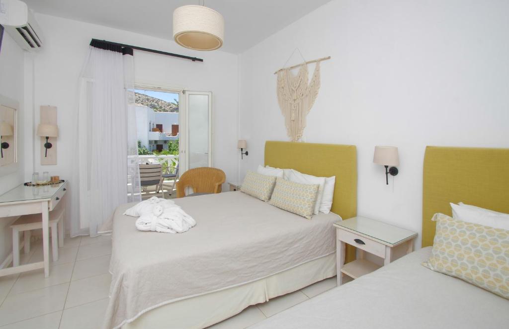 Кровать или кровати в номере Hotel Benois