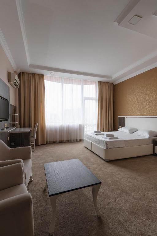 Postel nebo postele na pokoji v ubytování Grand Georgian Palace