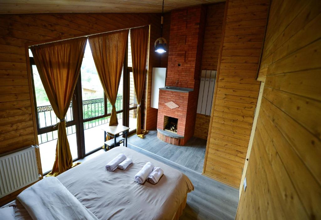 Voodi või voodid majutusasutuse The Grand Hotel Bakuriani toas