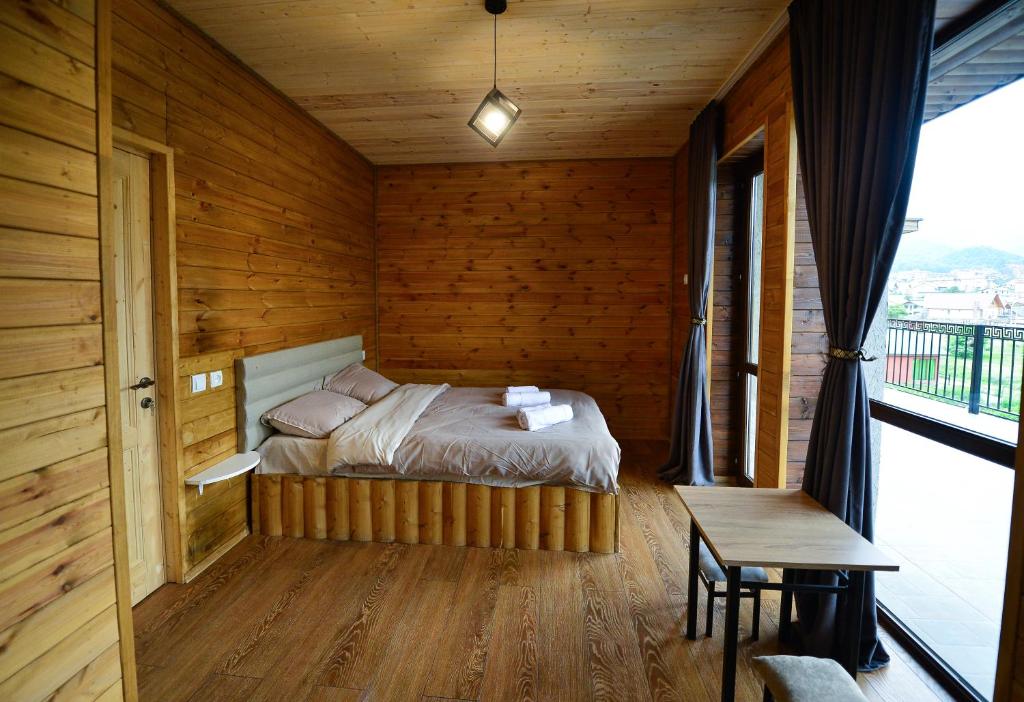 Voodi või voodid majutusasutuse The Grand Hotel Bakuriani toas