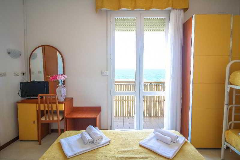 Postel nebo postele na pokoji v ubytování Hotel Carnaby