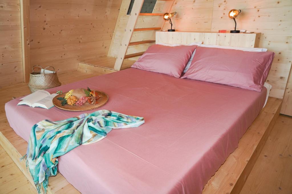 Postel nebo postele na pokoji v ubytování Glamping Fonte Murata