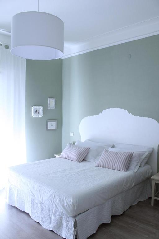 Posteľ alebo postele v izbe v ubytovaní B&B Nannalia