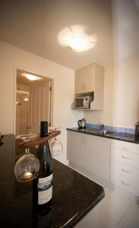Kuchyň nebo kuchyňský kout v ubytování Absolute Bliss Apartments