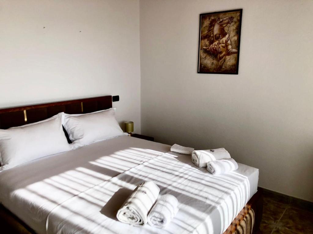Postel nebo postele na pokoji v ubytování Rooms by Lion
