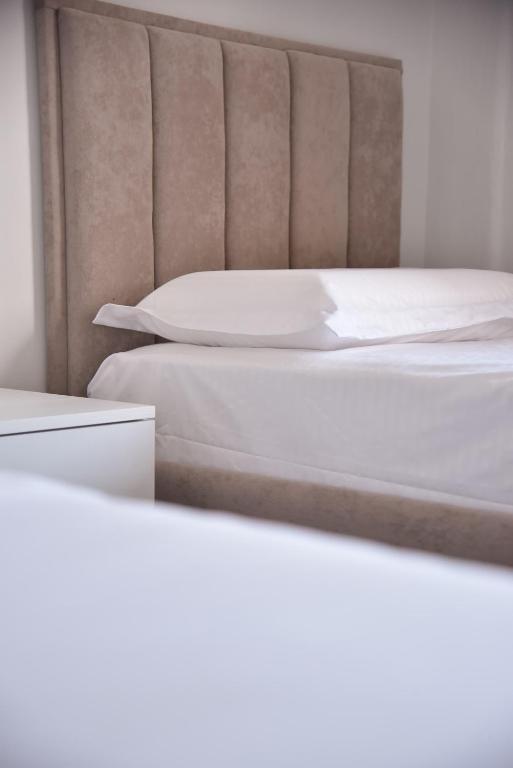 En eller flere senger på et rom på City Center INN