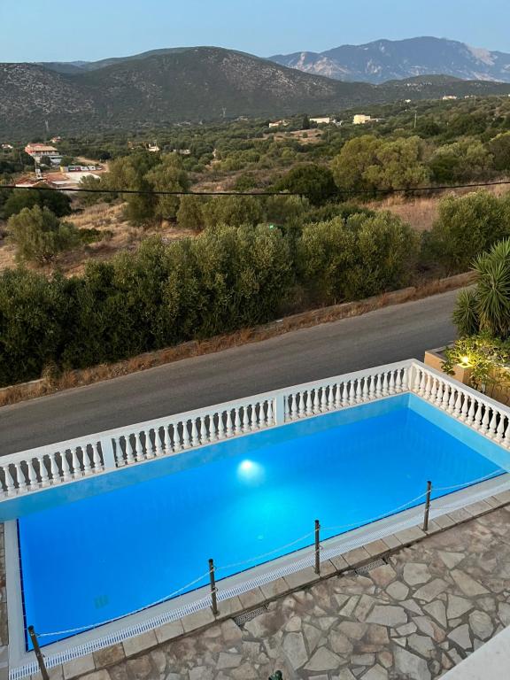 The swimming pool at or close to Irini's Villa
