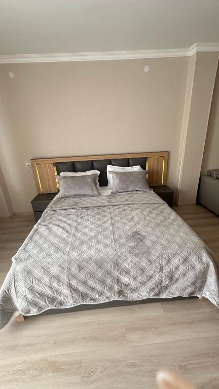 Postel nebo postele na pokoji v ubytování Natakhtari Residence