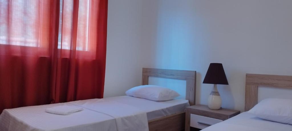 Postel nebo postele na pokoji v ubytování Tamaris apartments