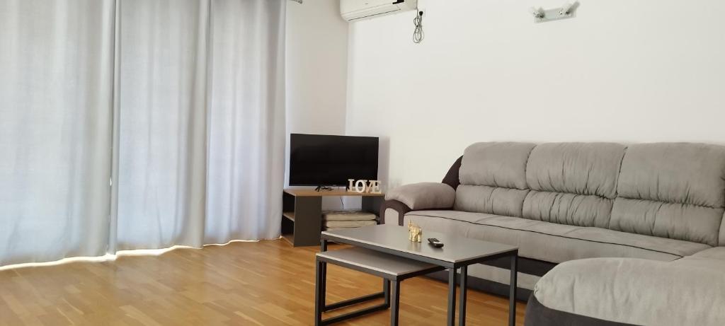 TV a/nebo společenská místnost v ubytování Tamaris apartments