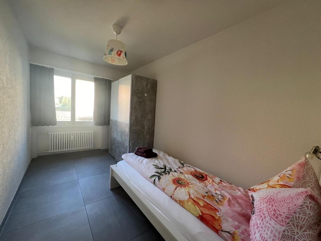 Postel nebo postele na pokoji v ubytování HANNA Apartment