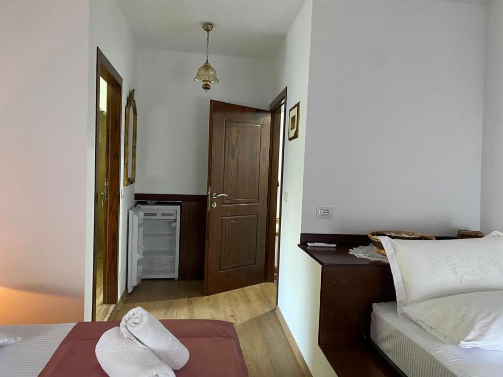 Postel nebo postele na pokoji v ubytování Yuri Guest House