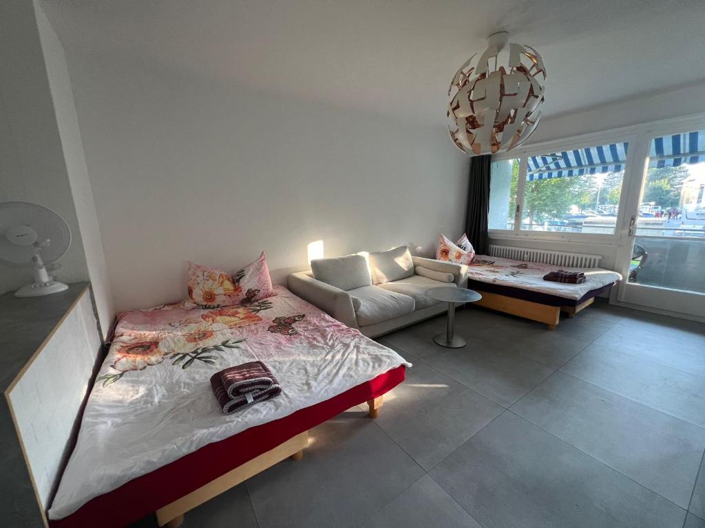 Postel nebo postele na pokoji v ubytování HANNA Apartment