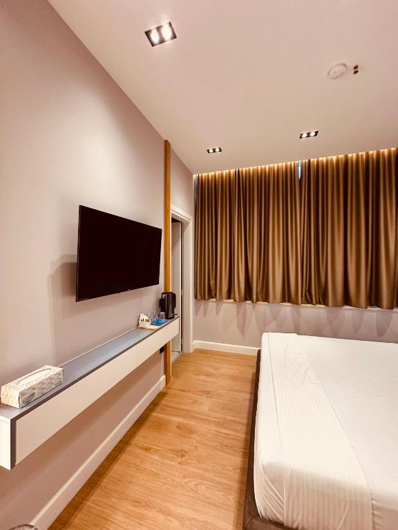 TV a/nebo společenská místnost v ubytování Azul Rooms Tirana