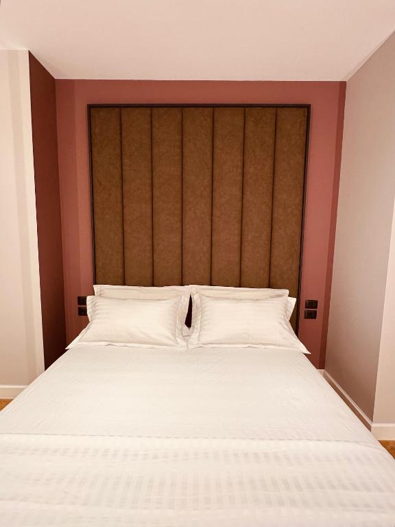 Postel nebo postele na pokoji v ubytování Azul Rooms Tirana