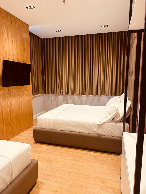 Postel nebo postele na pokoji v ubytování Azul Rooms Tirana