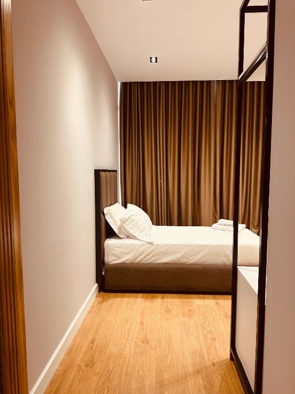 Postel nebo postele na pokoji v ubytování Azul Rooms Tirana