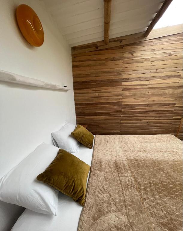 Letto o letti in una camera di La Mona Eco Cabins