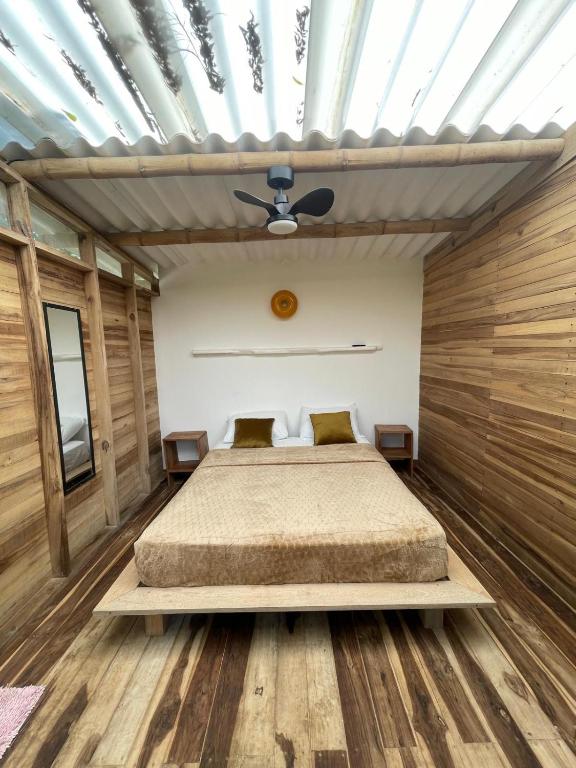 Letto o letti in una camera di La Mona Eco Cabins