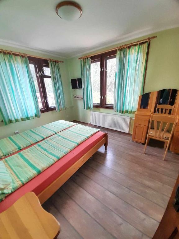 Postel nebo postele na pokoji v ubytování Guest House Lorian
