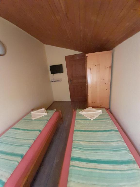 Postel nebo postele na pokoji v ubytování Guest House Lorian