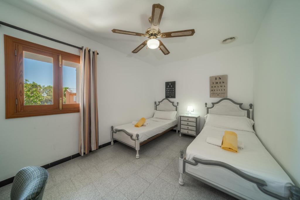 Postel nebo postele na pokoji v ubytování Villa CAS CARELLO by Mallorca Villa Selection