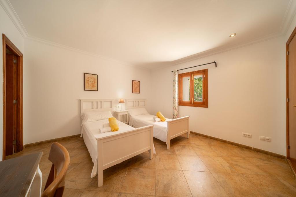 Postel nebo postele na pokoji v ubytování Villa CAS CARELLO by Mallorca Villa Selection