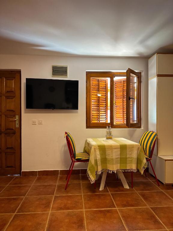 TV a/nebo společenská místnost v ubytování Cozy Place