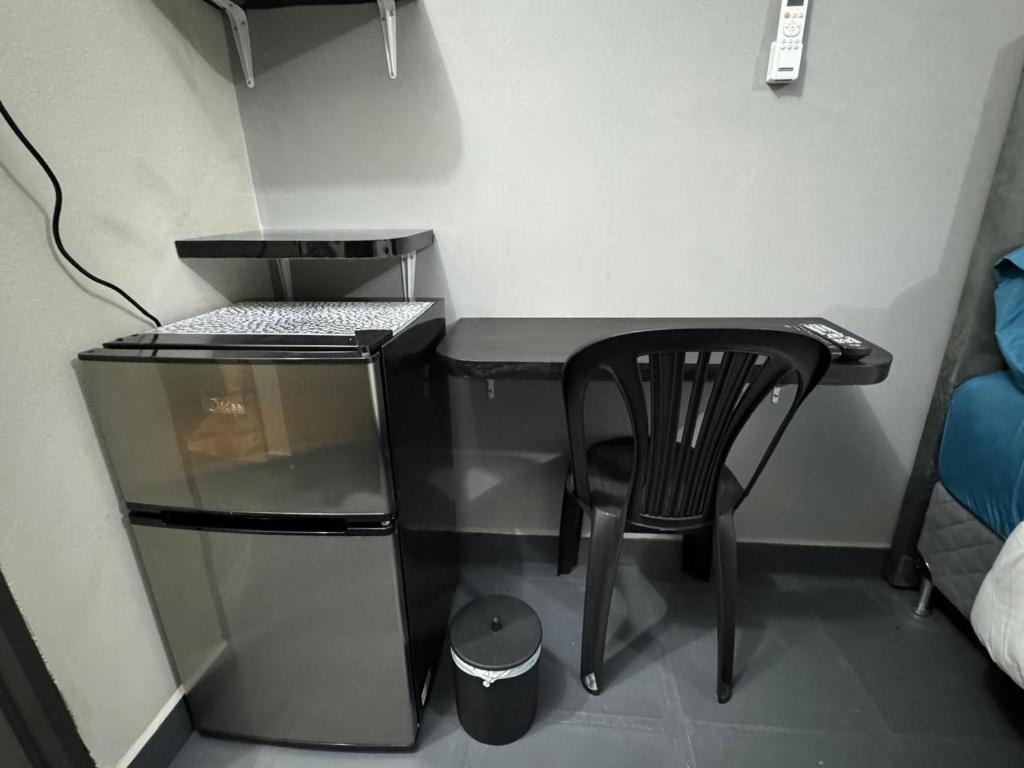 Kuchyň nebo kuchyňský kout v ubytování Habitación en el centro asunción solo efectivo guaranies