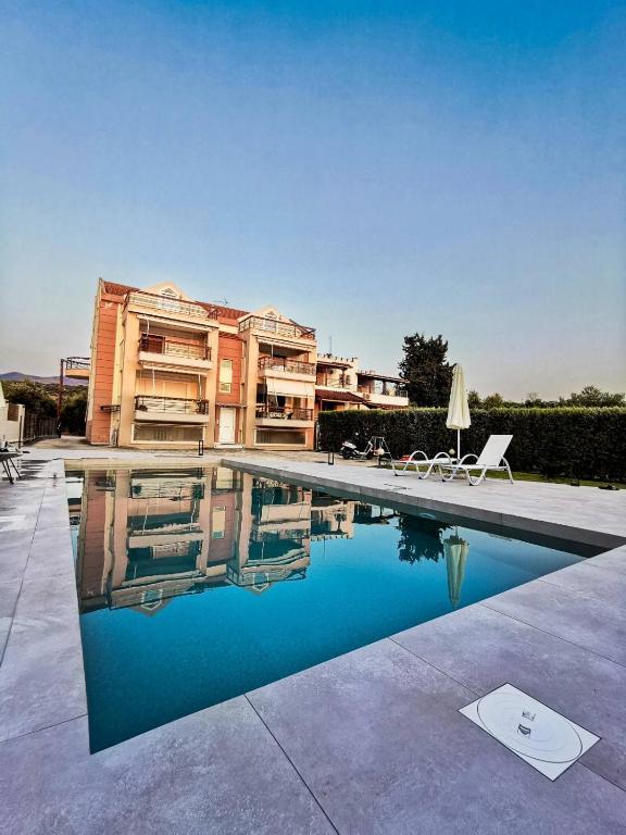 Bazén v ubytovaní Ostria Seaside Apartments alebo v jeho blízkosti