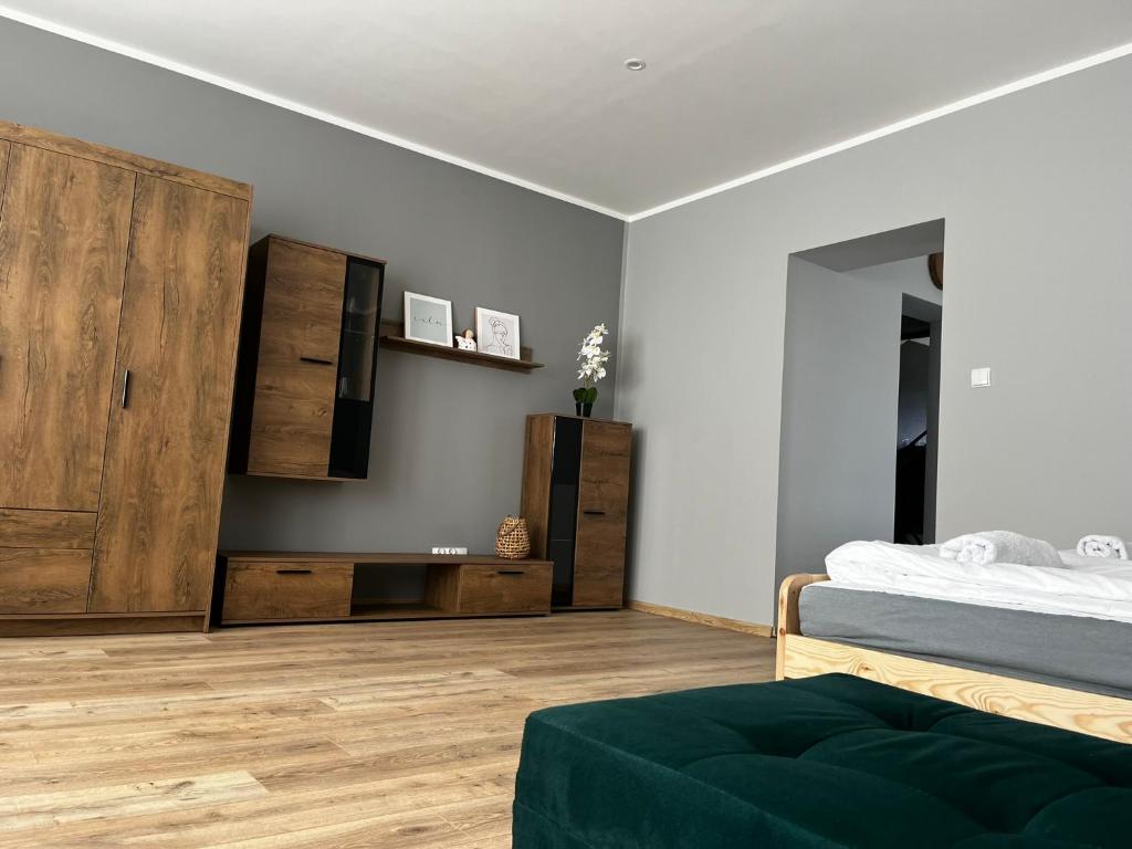 Postel nebo postele na pokoji v ubytování Beskid Rest Apartments