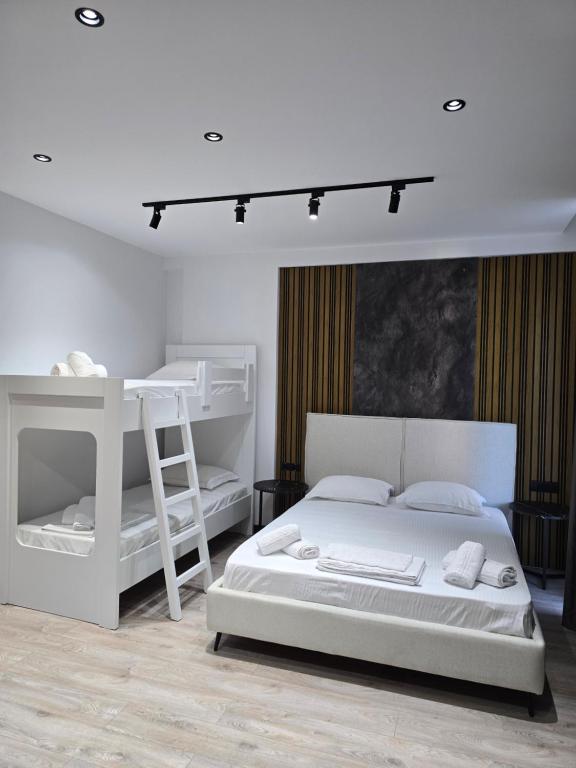 Postel nebo postele na pokoji v ubytování F&J Hotel