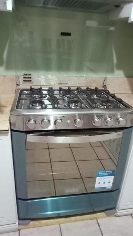 Kuchyň nebo kuchyňský kout v ubytování Dulce Hogar 01