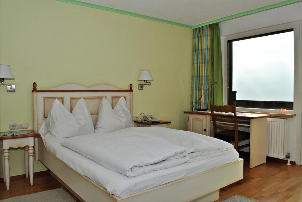 Postel nebo postele na pokoji v ubytování Hotel Daneu