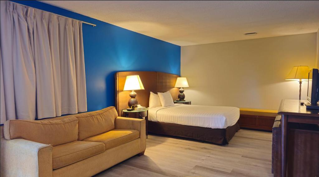 Postel nebo postele na pokoji v ubytování VIP Motel