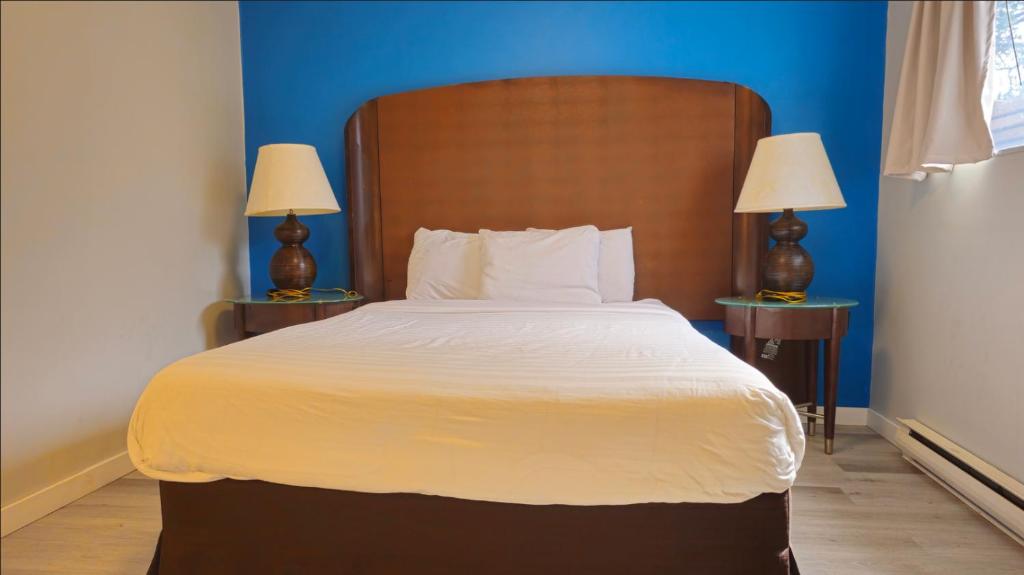 Postel nebo postele na pokoji v ubytování VIP Motel