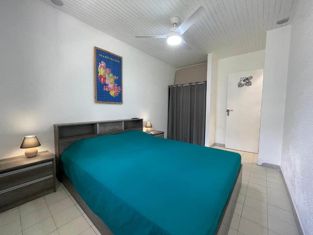 Postel nebo postele na pokoji v ubytování Villa Caraïbes