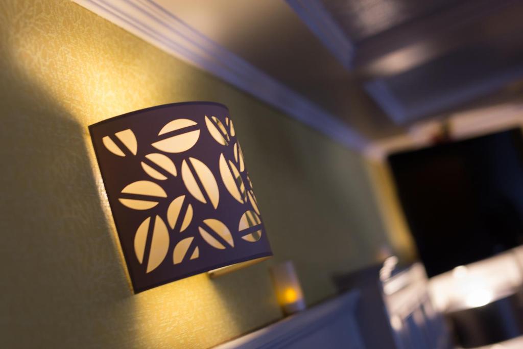 TV a/nebo společenská místnost v ubytování Ballyliffin Hotel