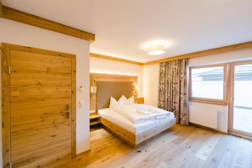 Posteľ alebo postele v izbe v ubytovaní Hotel Giessenbach
