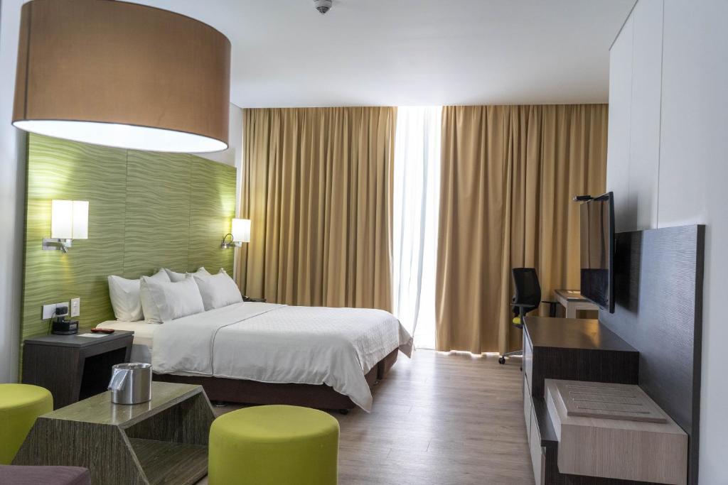 Postel nebo postele na pokoji v ubytování Holiday Inn Express - Cartagena Bocagrande by IHG