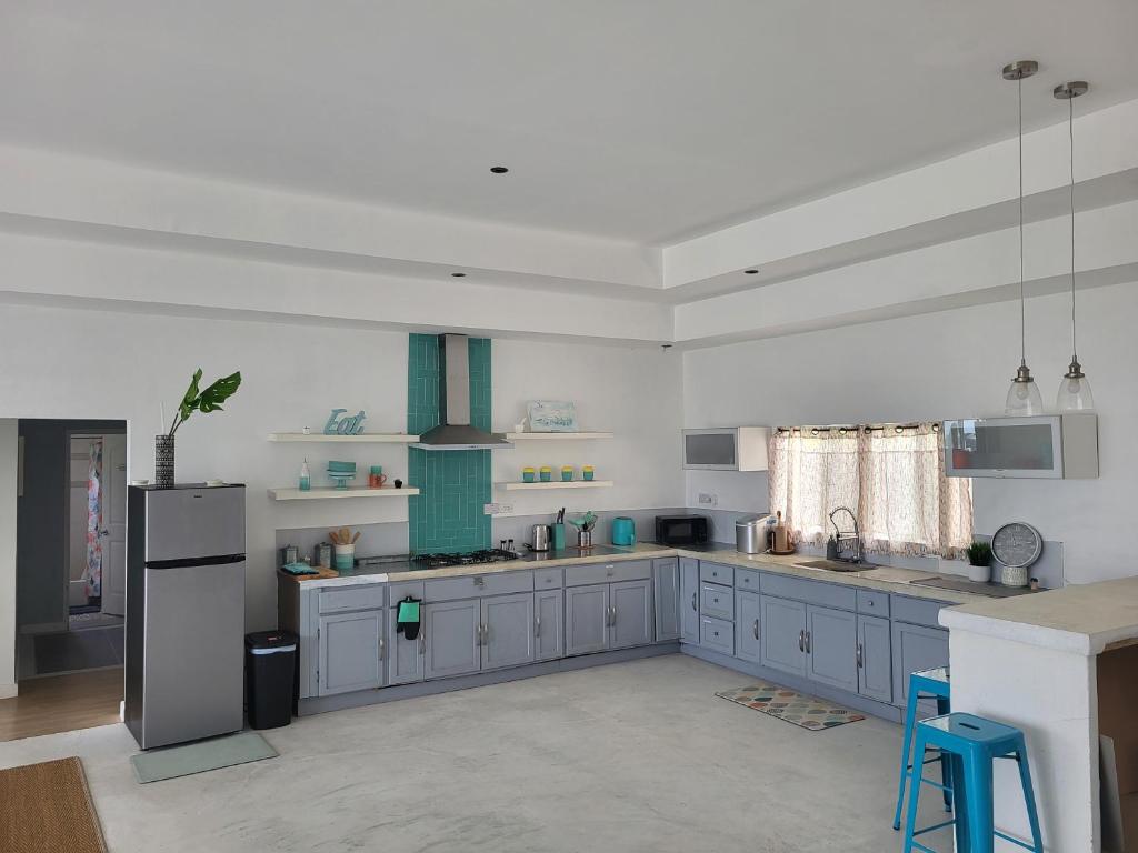Kuchyň nebo kuchyňský kout v ubytování Diamond Villa