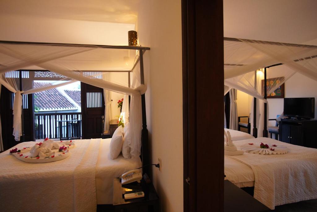 Phòng Grand Deluxe Gia Đình Thông Nhau Qua Cửa Nối