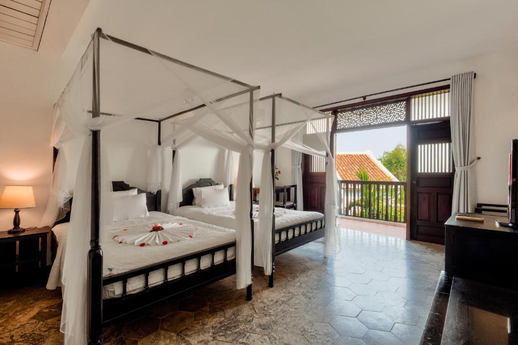 Phòng Grand Deluxe Gia Đình Thông Nhau Qua Cửa Nối