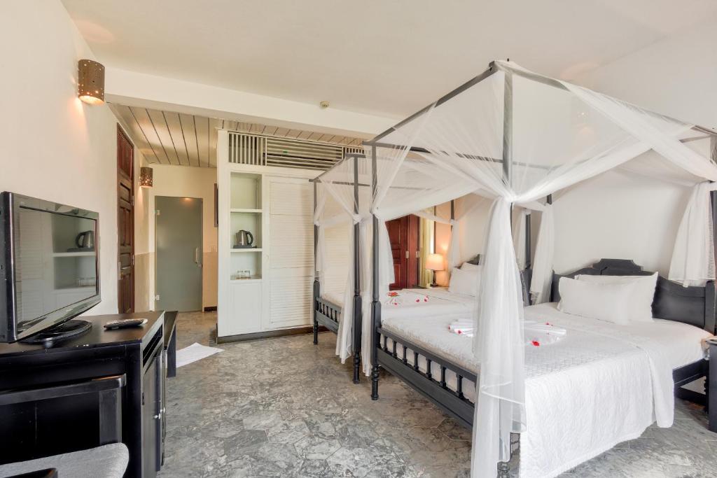 Phòng Grand Deluxe Giường đôi/2 Giường đơn với Ban công