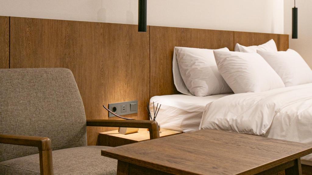 Postel nebo postele na pokoji v ubytování Hotel Yimok