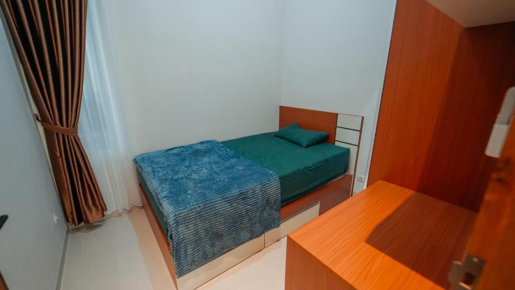 Postel nebo postele na pokoji v ubytování Guest House Sambilegi